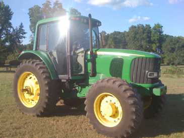 相片: 出售 汽车 JOHN DEERE 7320